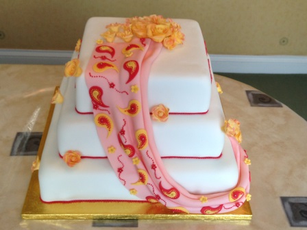 Drape and paisleys wedding cake